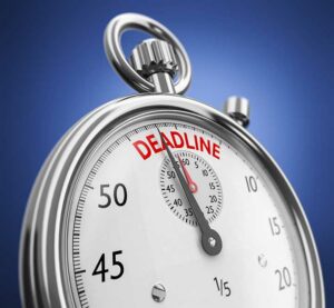 statute of limitations concept, ticking clock with word deadline