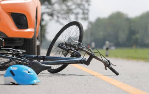 Bike on road car crash Victorville bicycle accident lawyer concept