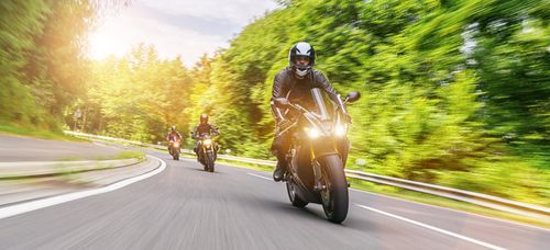 Image is of three motorcyclists riding on a road concept of Fullerton motorcycle accident lawyer