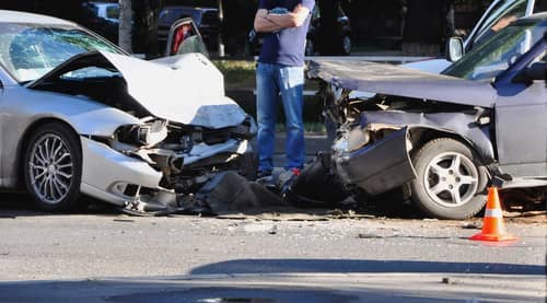 head-on collision of two cars