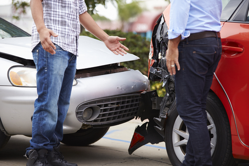 Two drivers arguing after traffic accident