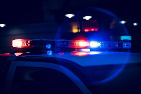 photo of a police car with sirens