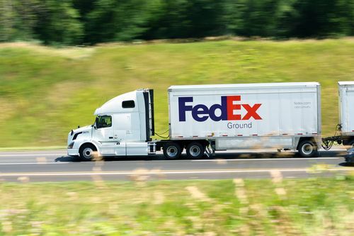 Photo of a truck driving on the highway