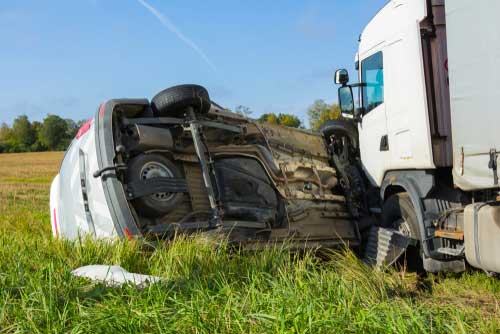 A car and a truck in an accident