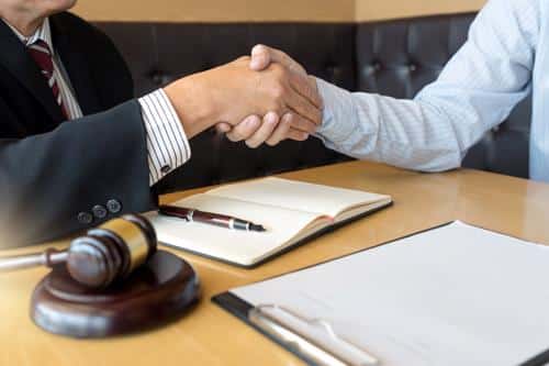 An injury attorney reviewing a claim for a client.